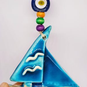 Boat with evil eye wall hanging