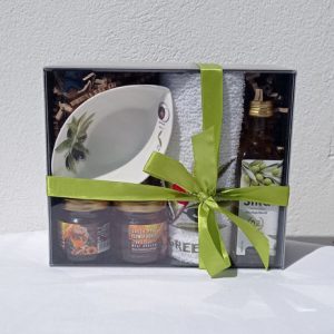 Gift box with honey, towel, bowl and olive oil