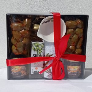 Gift box with olive oil, olives, honey, bowl and towel
