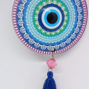 Small colorful wood wall hanging decoration with mandala pattern and evil eye