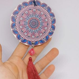 Small red wood wall hanging decoration with mandala pattern and evil eye