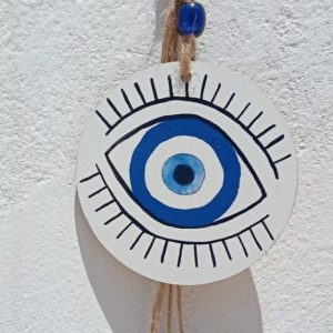 White wood wall hanging decoration with evil eye