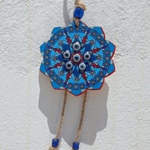 Blue wood wall hanging decoration with flower and evil eye
